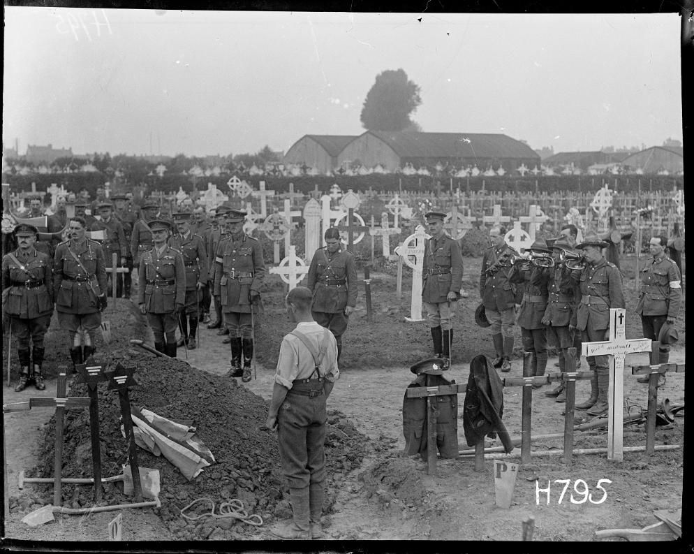 The funeral of Brigadier-General Francis Earl Johnston, with The Last Post being played. Bailleul, 12 August 1917.